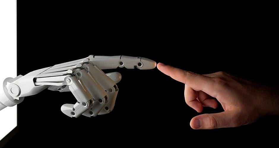 robot and human hands fingers touching